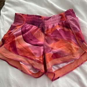 Athleta Racer Run shorts size small 4” inseam